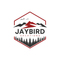 Logo for Jaybird Vacations: Mountains with a lightning bolt, trees, and flying birds, in a red hexagon.