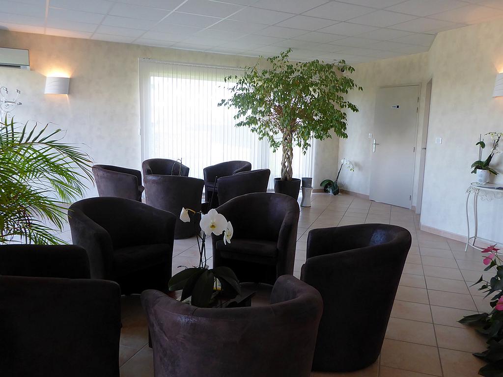 Salon cosy de l'agence de La Tremblade