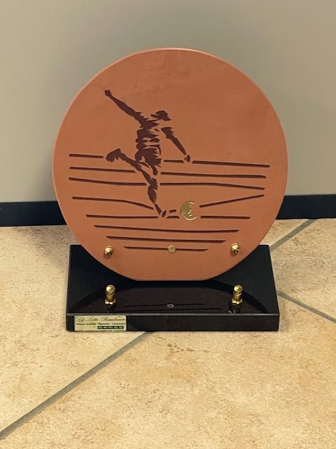 Footballeur représenté sur plaque