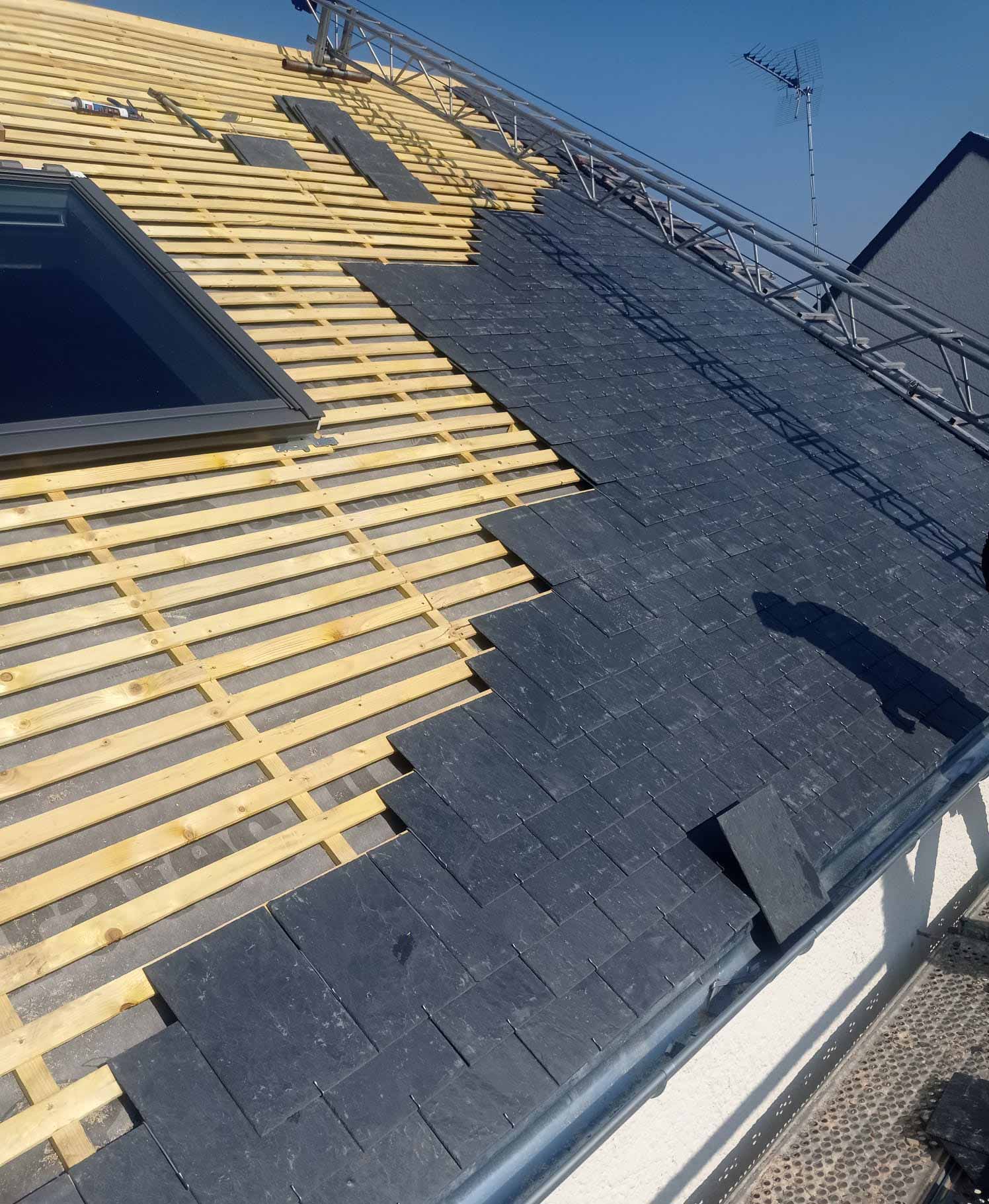 Rénovation d'une toiture en ardoise