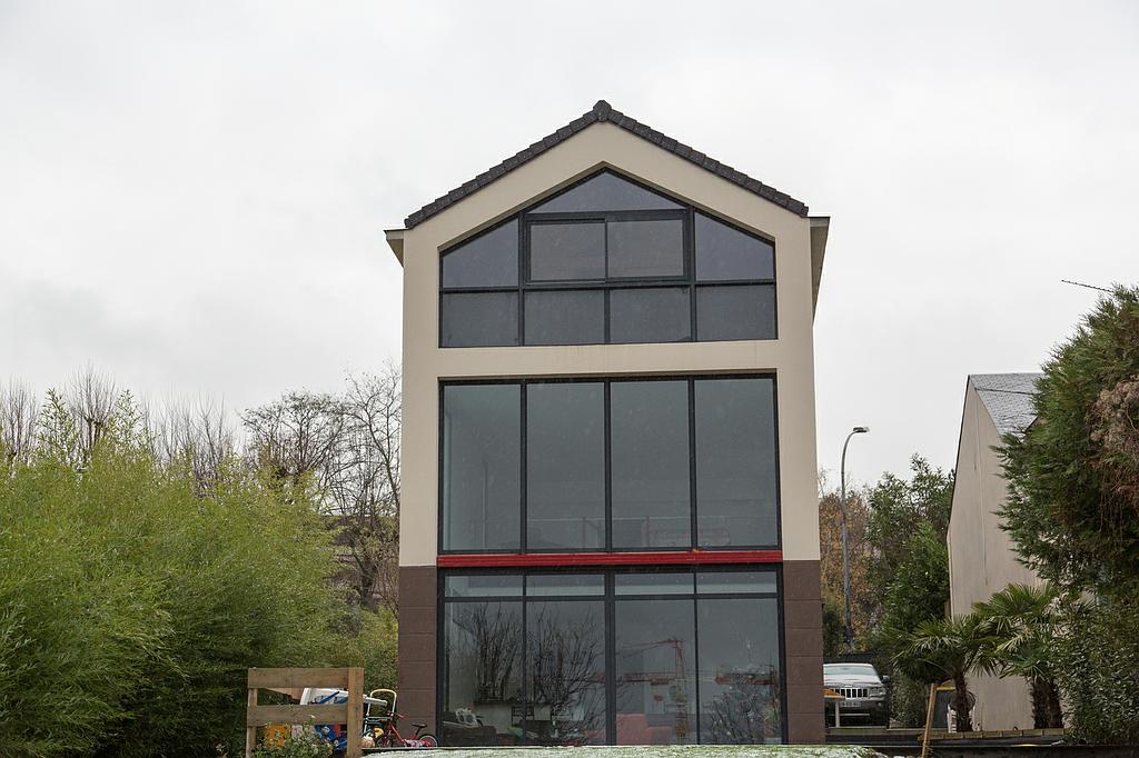 Baie vitrée avec renforcement structure