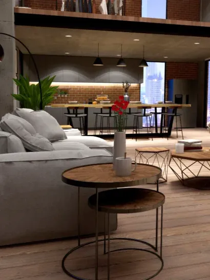 Sala de estar moderna con sofá gris, mesas redondas y cocina abierta al fondo.