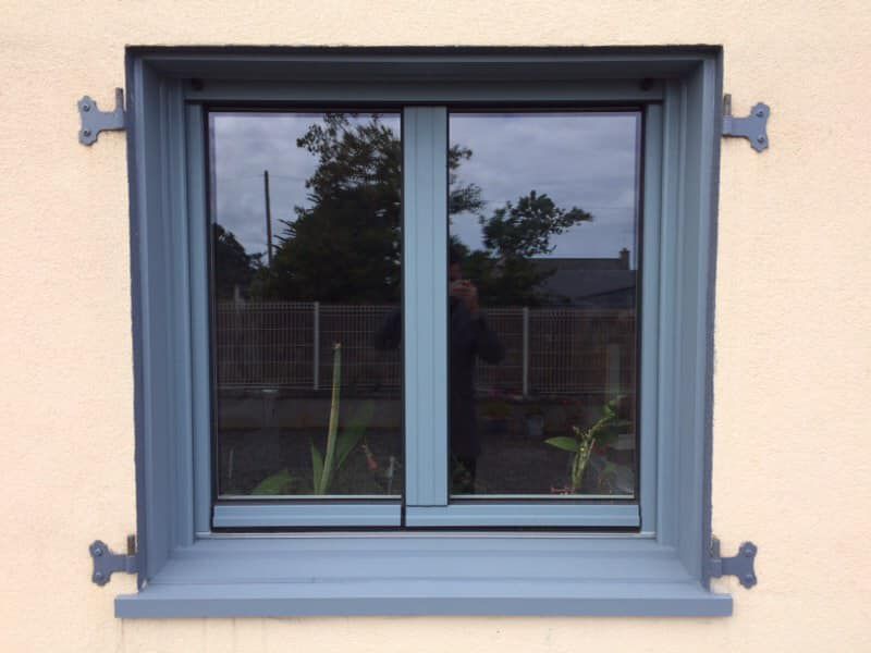 Double fenêtres d'une maison de type traditionnel