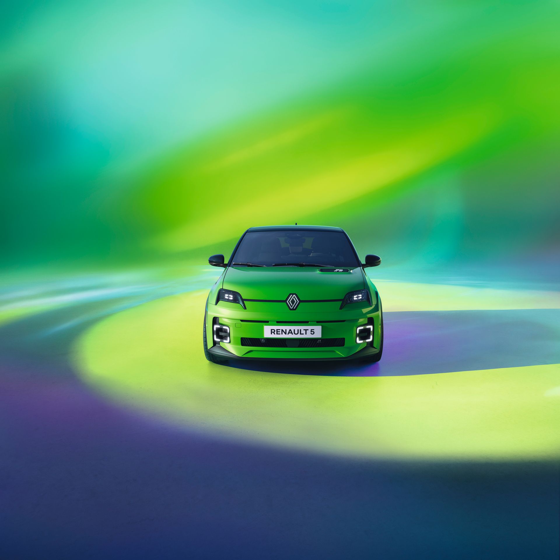 Une voiture verte sur un fond vert.