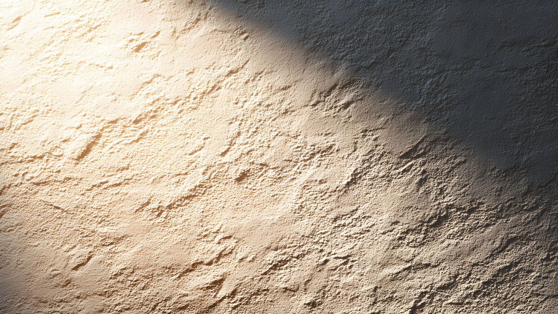 Surface texturée, brun clair, avec une ombre diagonale.