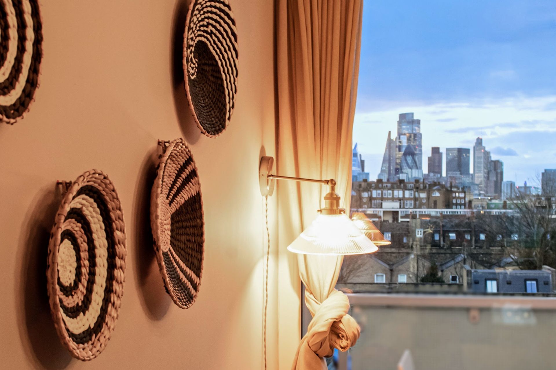 ambient living room lighting with views of london skyline from the window