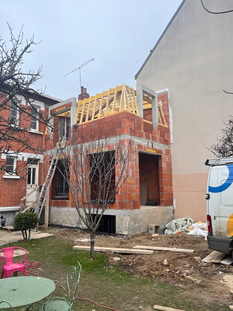 Équipe sur un chantier de surélévation