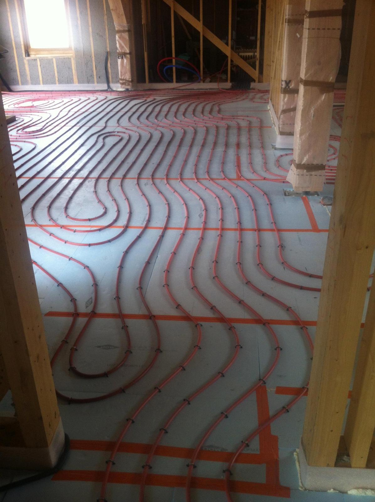 Plancher chauffant dans une maison bois