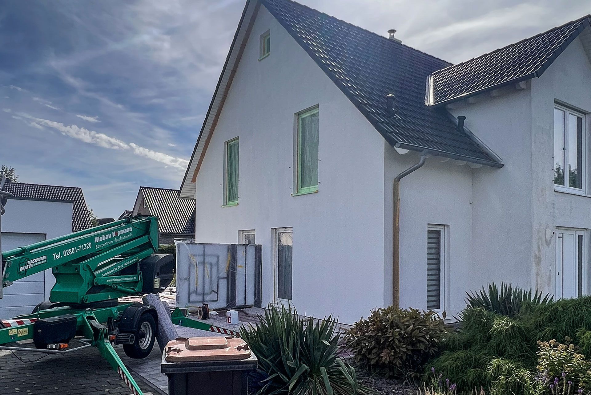 Reinigen einer Hausfassade