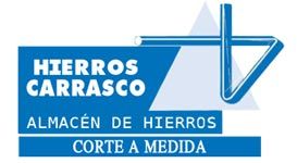A blue sign that says hierros carrasco almacen de hierros corte a medida