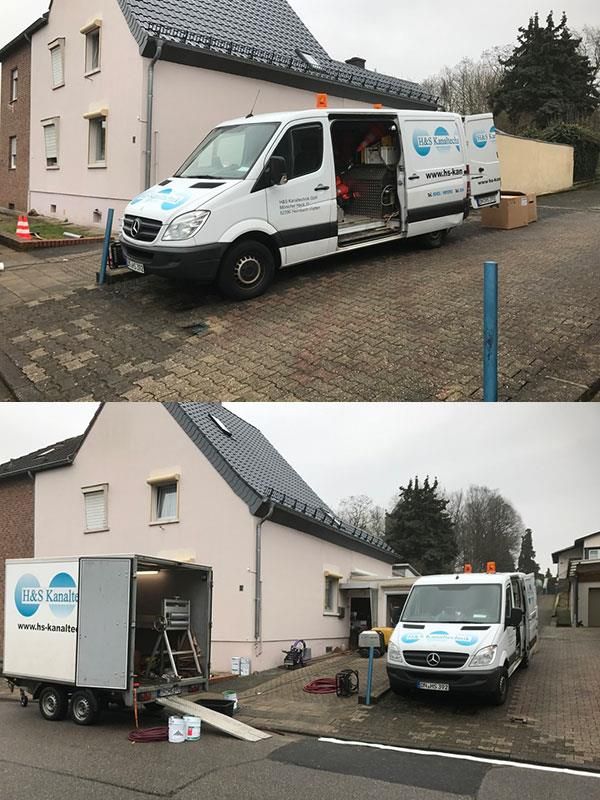 Ein weißer Lieferwagen steht vor einem Haus.