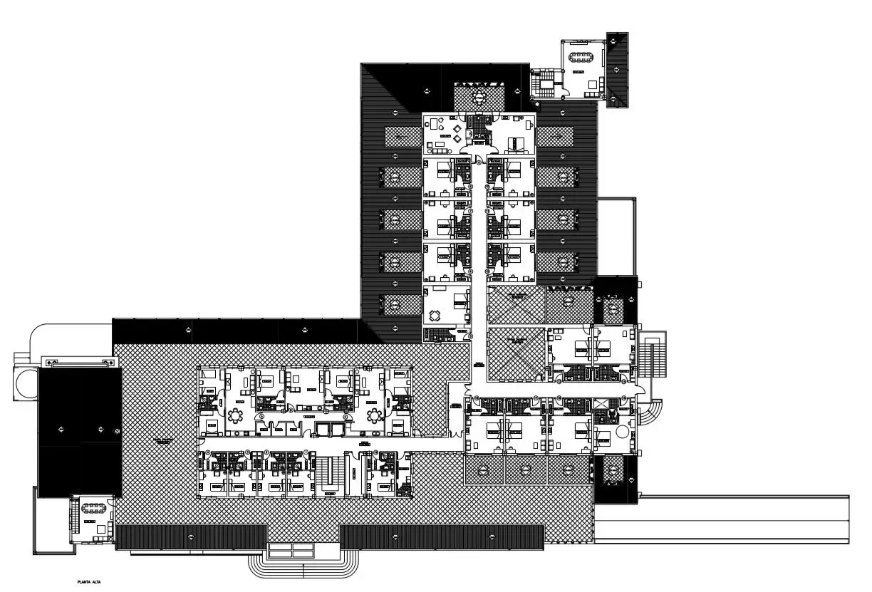 Plano arquitectónico en blanco y negro de un edificio con varias habitaciones, incluyendo pasillos, habitaciones y distribución estructural.