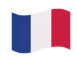 Un drapeau français flottant au vent, orné de rayures verticales bleues, blanches et rouges.