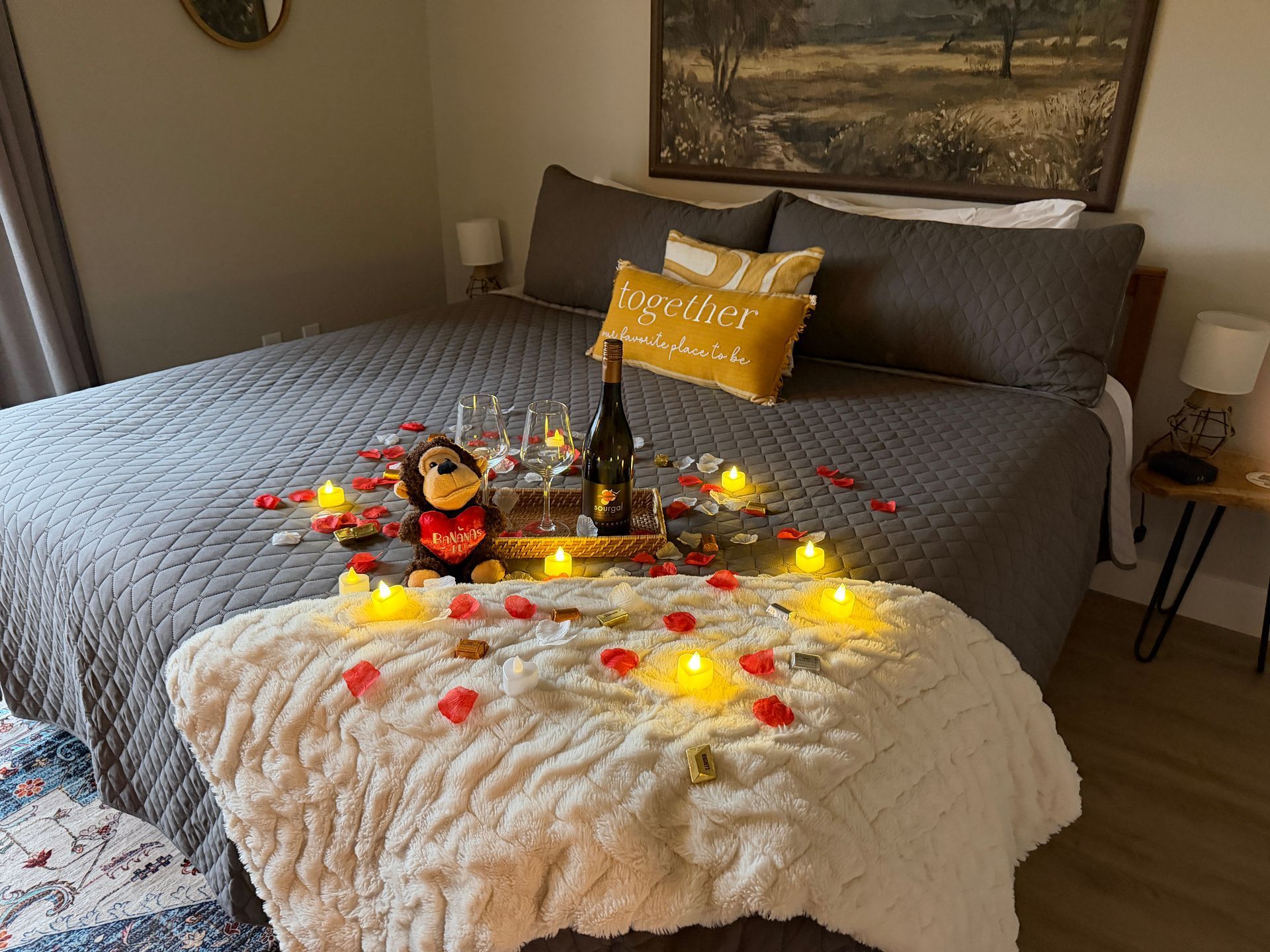 Romantic bedroom setup in Branson Missouri vacation rental with candles and soft lighting