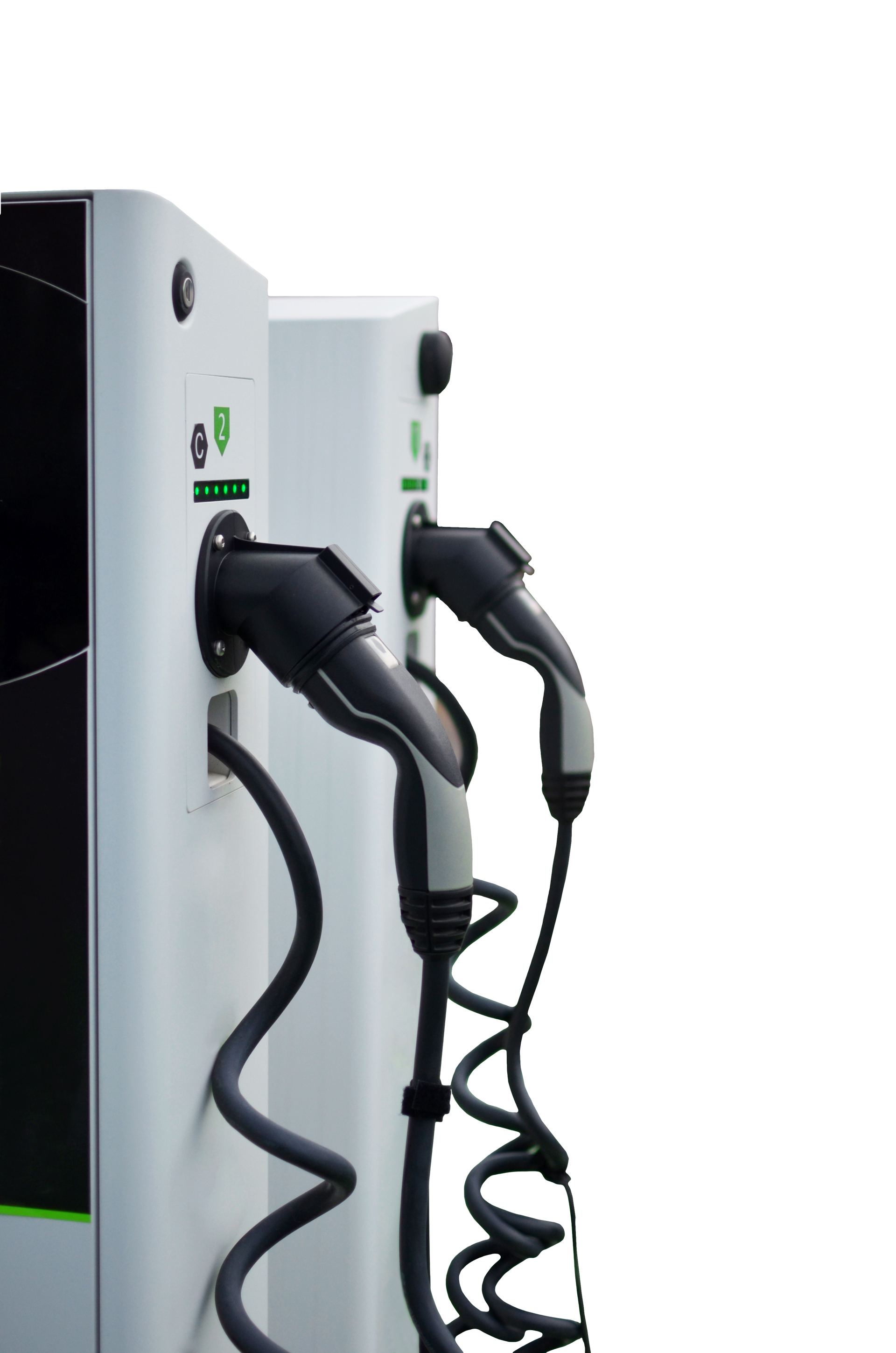 Deux bornes de recharge blanches pour véhicules électriques avec câbles de recharge.