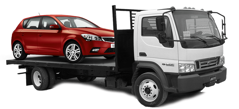 Voiture rouge sur une dépanneuse