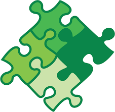 Zwei grüne Puzzleteile sind übereinander gestapelt.