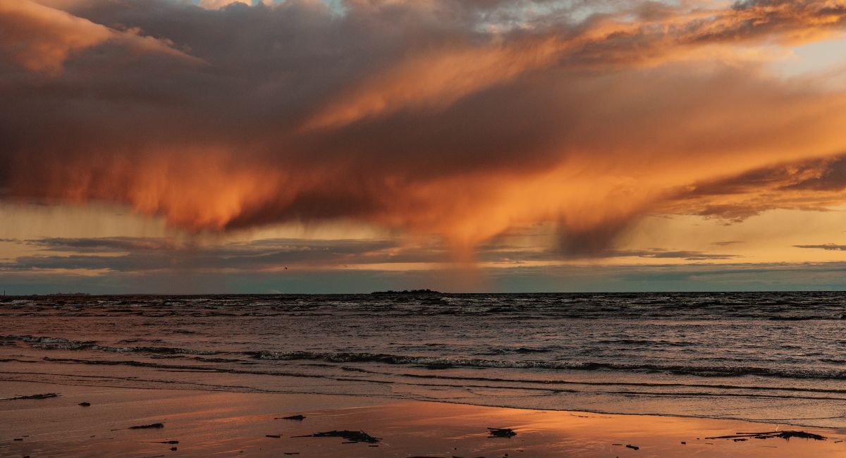 Dramatic cloud formations over Gearhart beach at sunset in October