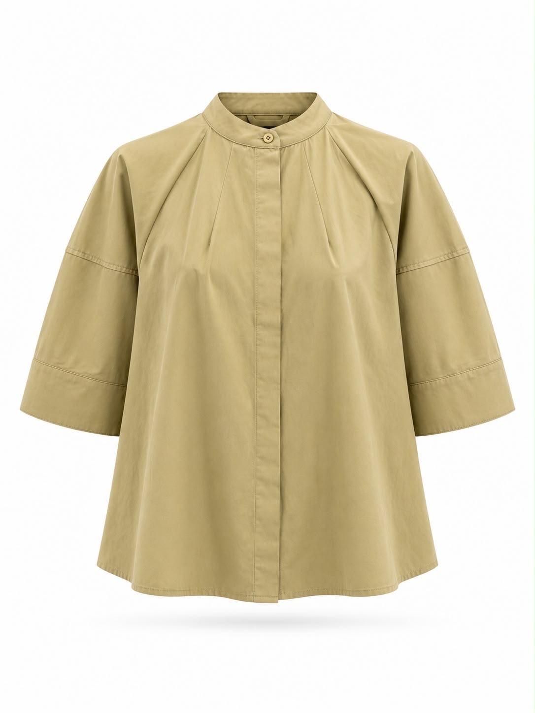 Top de mujer beige de corte holgado con mangas tres cuartos y cuello mandarín.