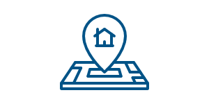 Un plan et une maison dans un pin's de localisation.