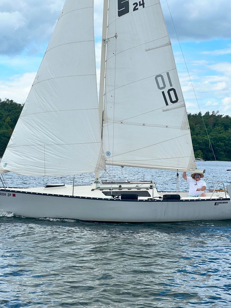 A sailboat with the number 10 on the sail