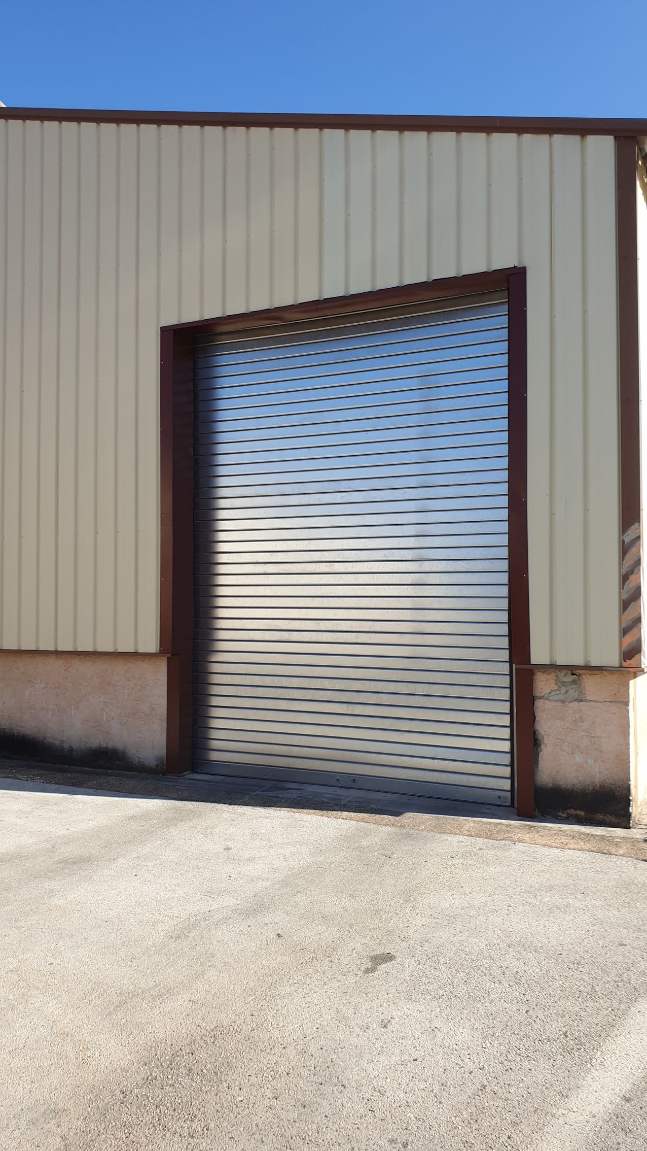 Rideau métallique galvanisé lames pleines