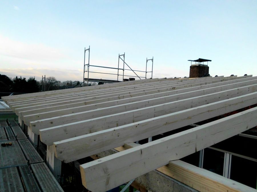 Ikom GmbH Dächer aus Holz