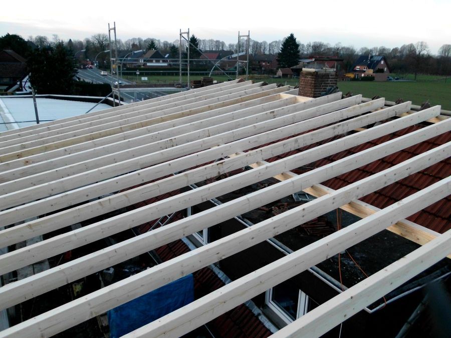 Ikom GmbH Dächer aus Holz