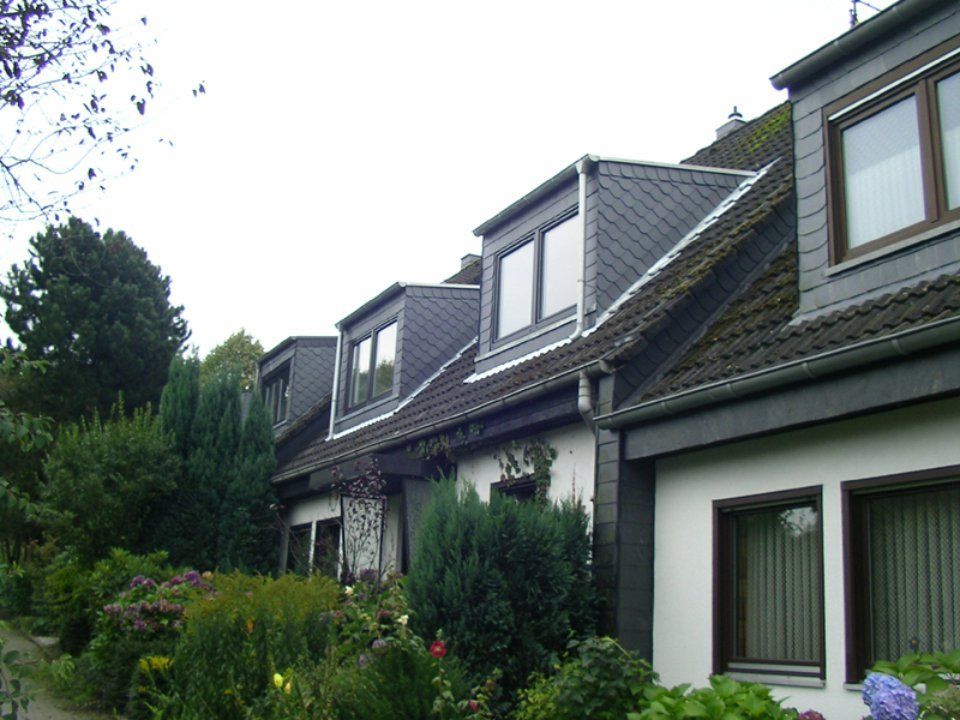 Foto von zwei Dachgauben, gefertigt von Thüs Zimmermeister GmbH Zimmerei-Holzbau