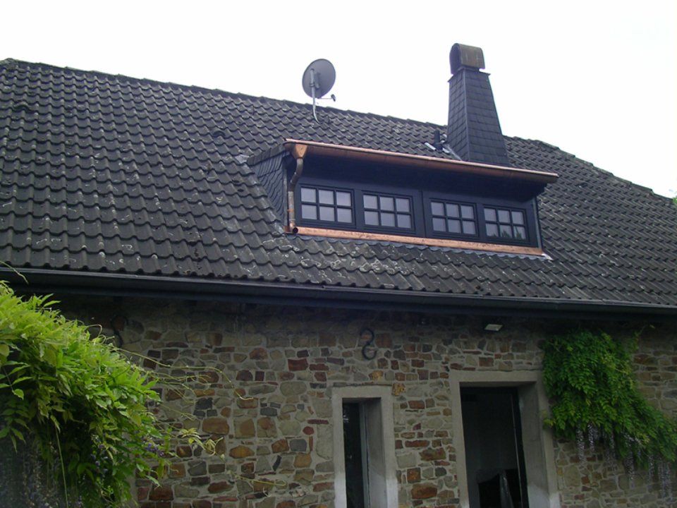 Foto von traditioneller Dachgaube, gefertigt von Thüs Zimmermeister GmbH Zimmerei-Holzbau