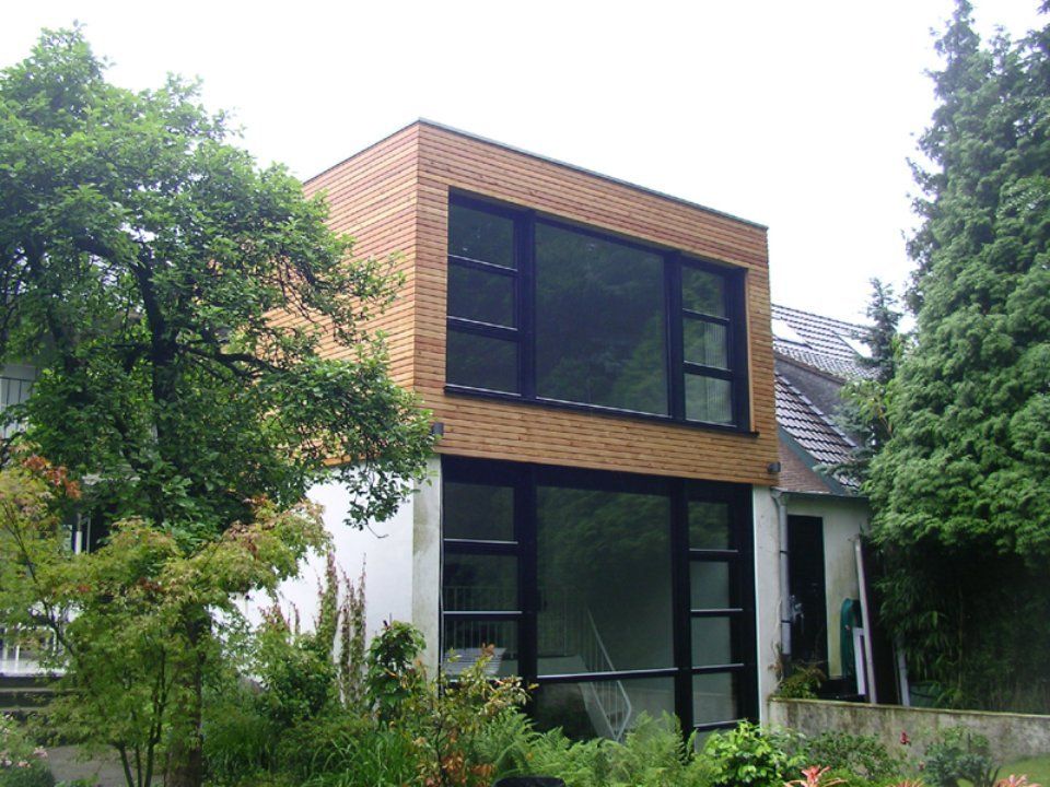 Holzfassade, gefertigt von Thüs Zimmermeister GmbH Zimmerei-Holzbau