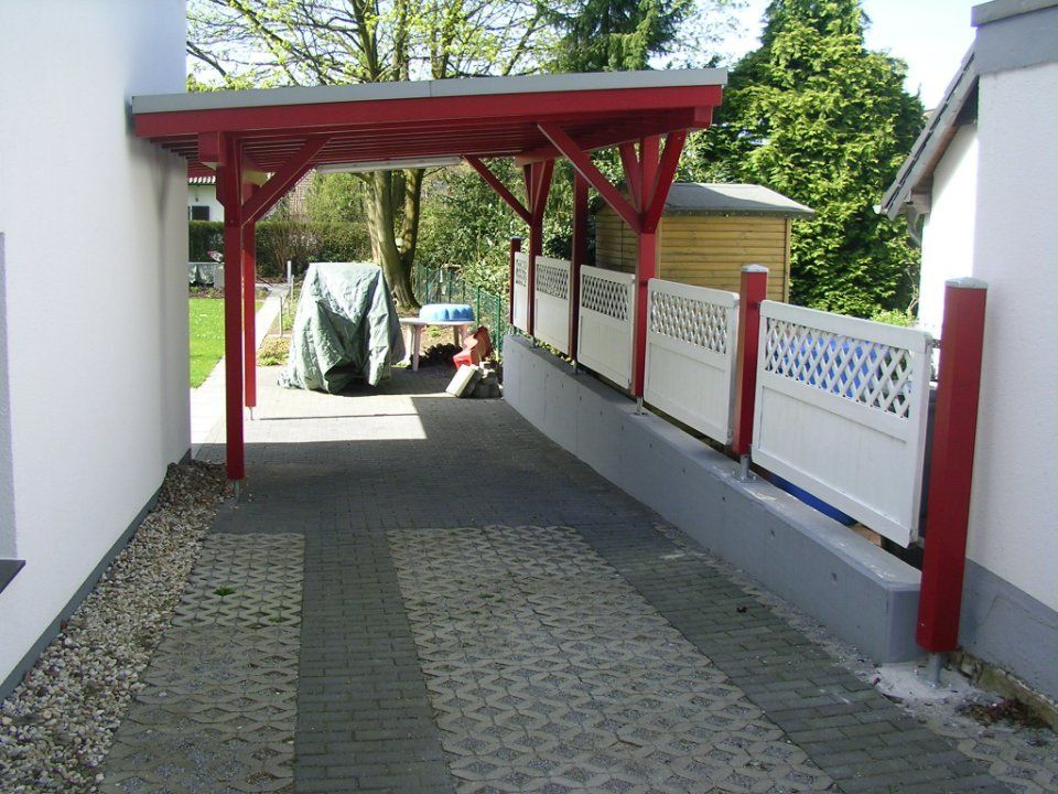 Carport in Rot 1, gefertigt von Thüs Zimmermeister GmbH Zimmerei-Holzbau