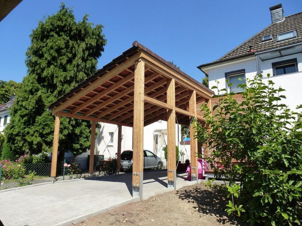 Moderner Carport, gefertigt von Thüs Zimmermeister GmbH Zimmerei-Holzbau