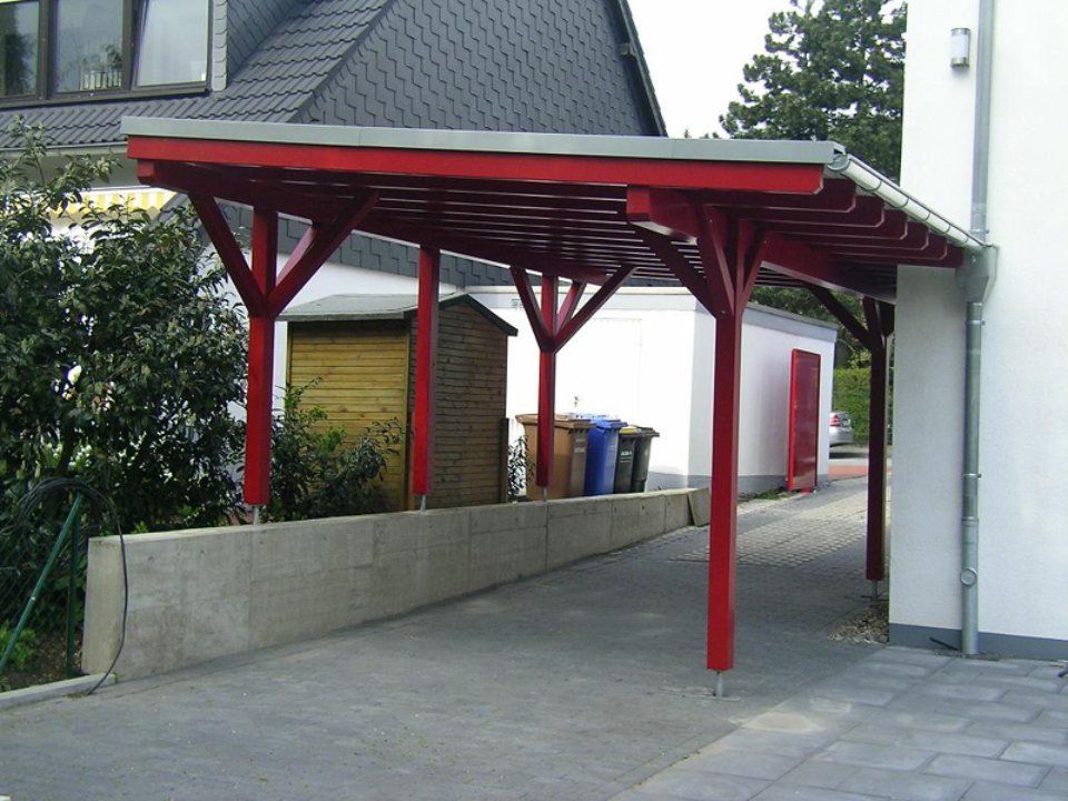 Carport in Rot 3, gefertigt von Thüs Zimmermeister GmbH Zimmerei-Holzbau