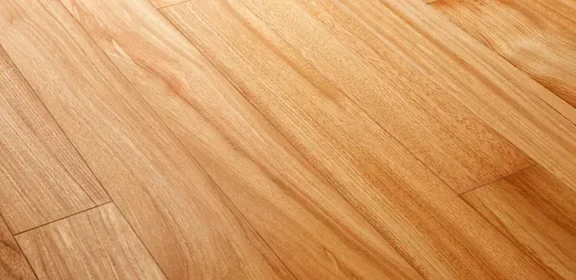 Es un primer plano de un piso de madera.