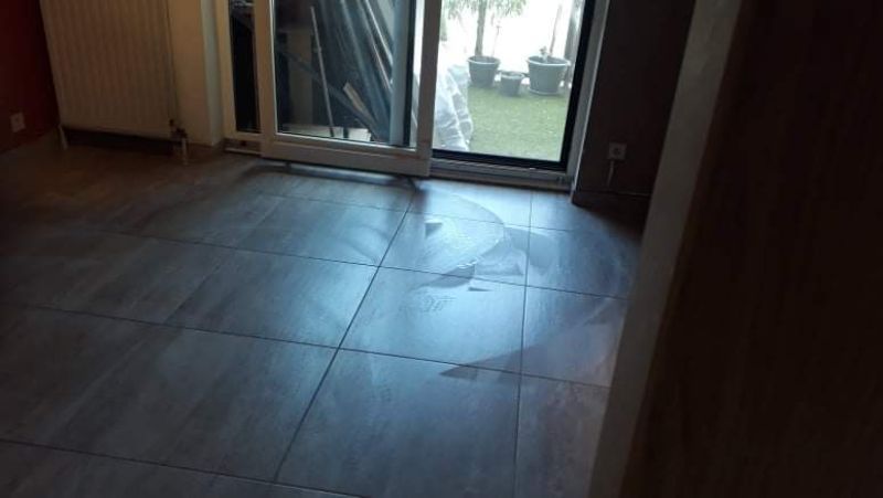 Nieuwe tegelvloer woning