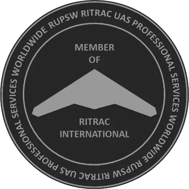 Un logotipo en blanco y negro para RUPW Ritrac UAS, servicios profesionales en todo el mundo.