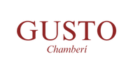 "GUSTO" en rojo, con "Chamberi" debajo en una fuente cursiva m&aacute;s peque&ntilde;a; fondo blanco.