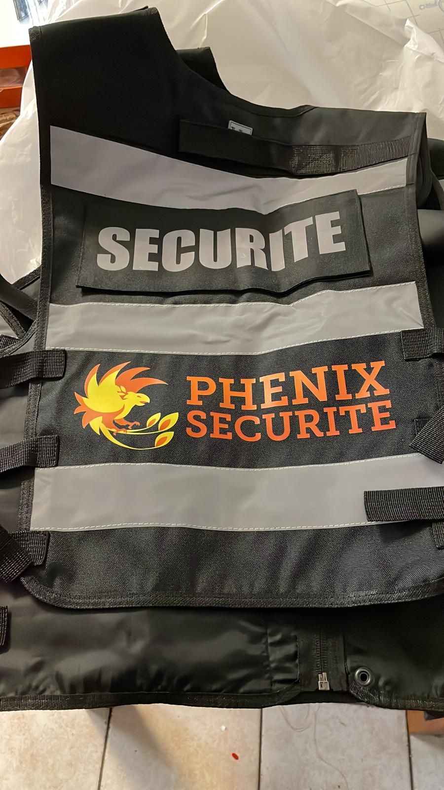Veste sans manche avec le logo de Phénix Sécurité