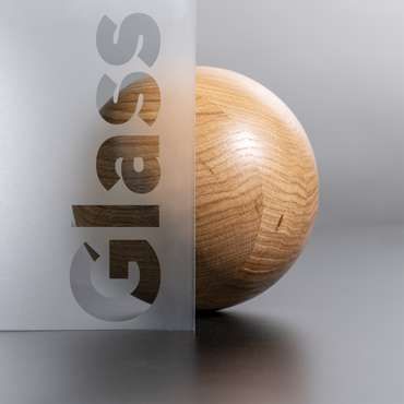 Une sphère en bois et texture de verre