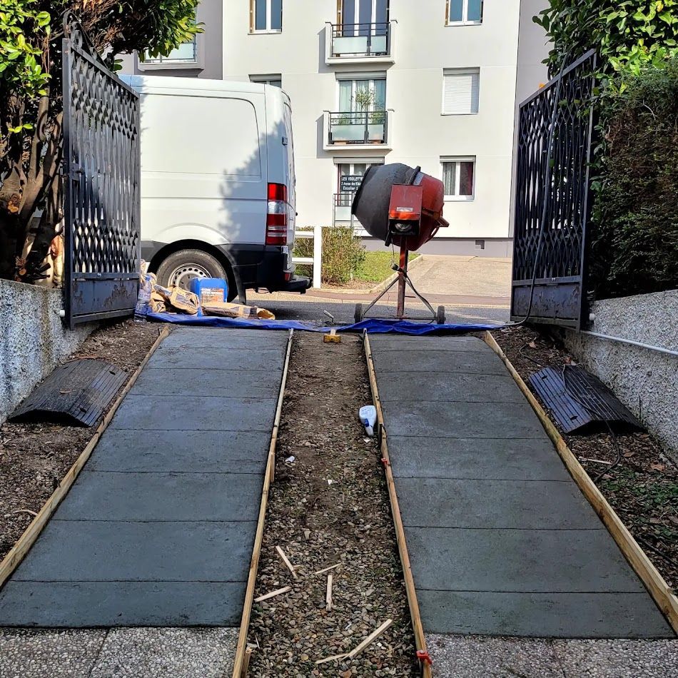Réhaussement descente de garage en cours