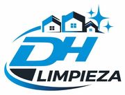 Logo azul y negro de &ldquo;DH Limpieza&rdquo; con casas y destellos arriba