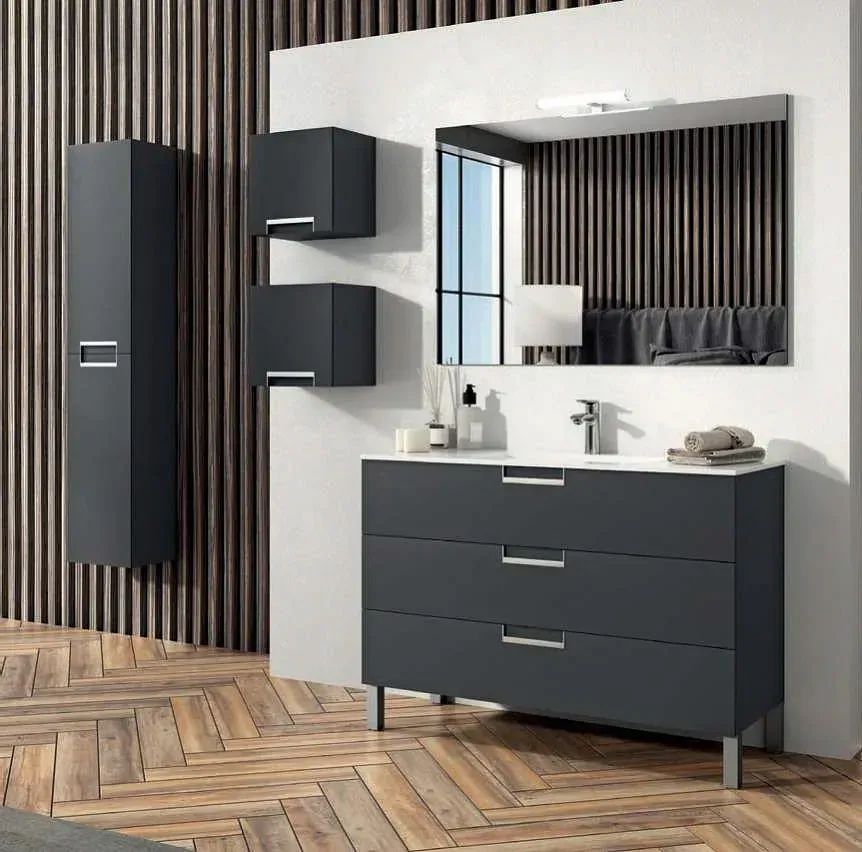 Un baño con una cómoda, un lavabo y un espejo.