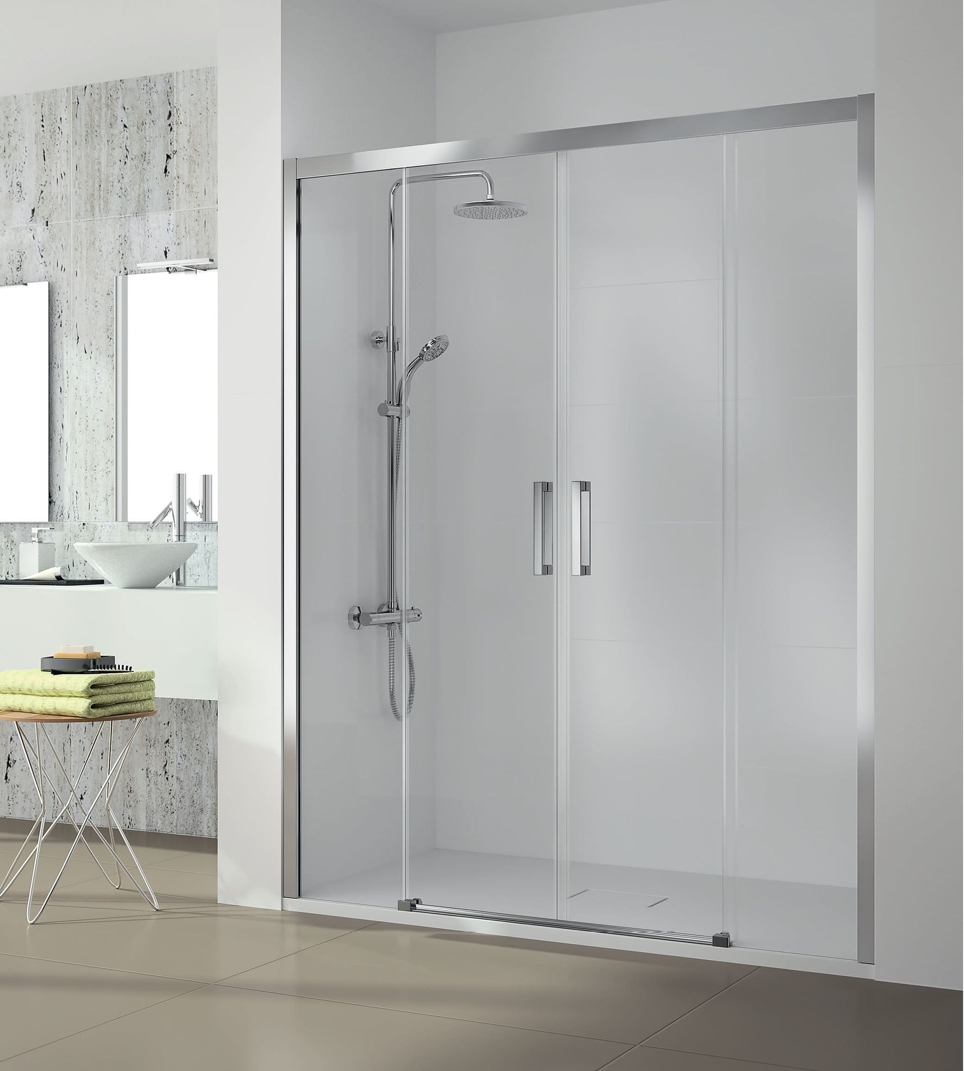 Un baño con una puerta de ducha corrediza de cristal.