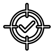 Un icono en blanco y negro de un objetivo con una marca de verificación en el medio.
