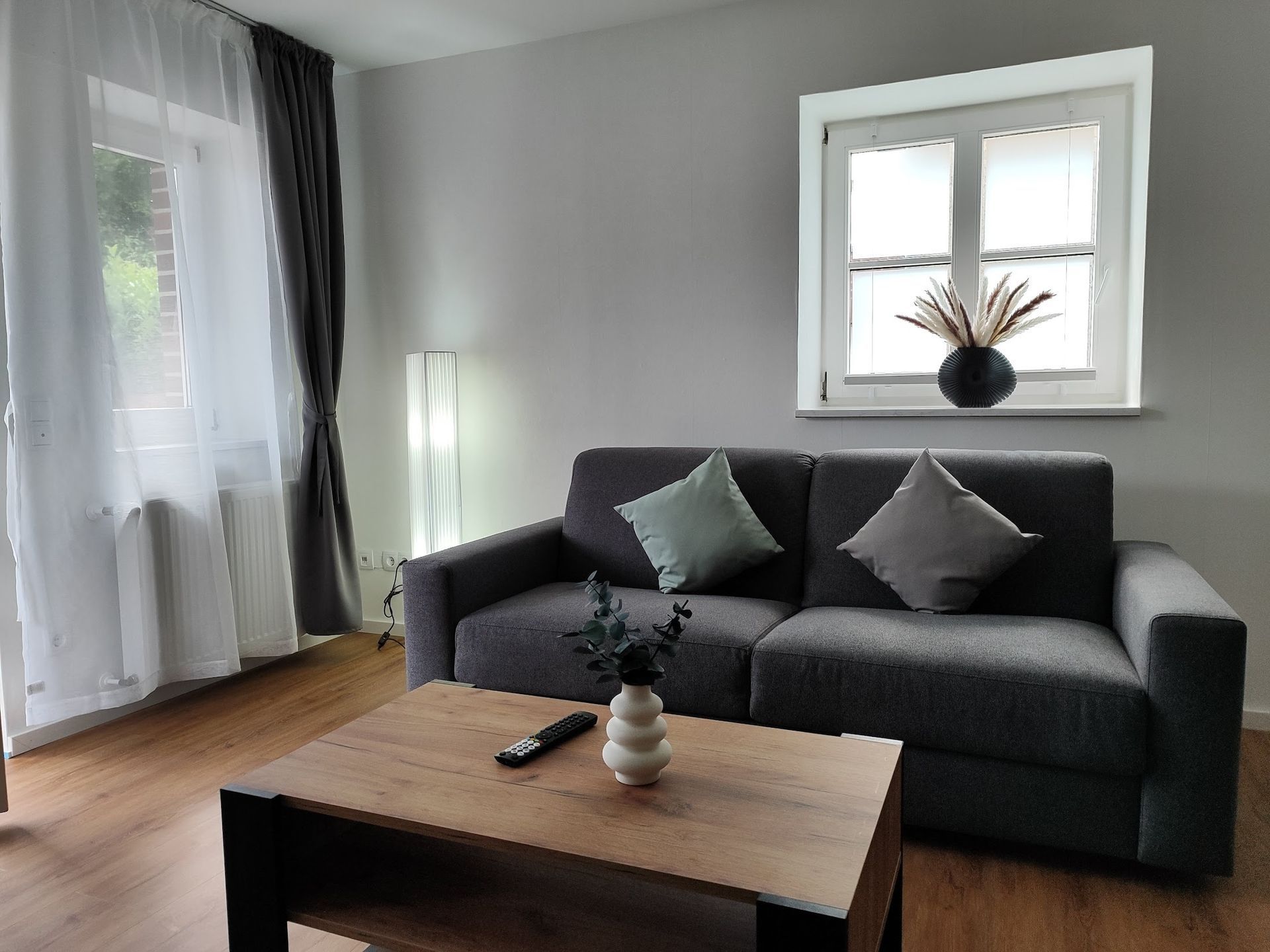 Wohnzimmer der Ferienwohnung Apartment Marissa in Billerbeck mit Schlafcouch