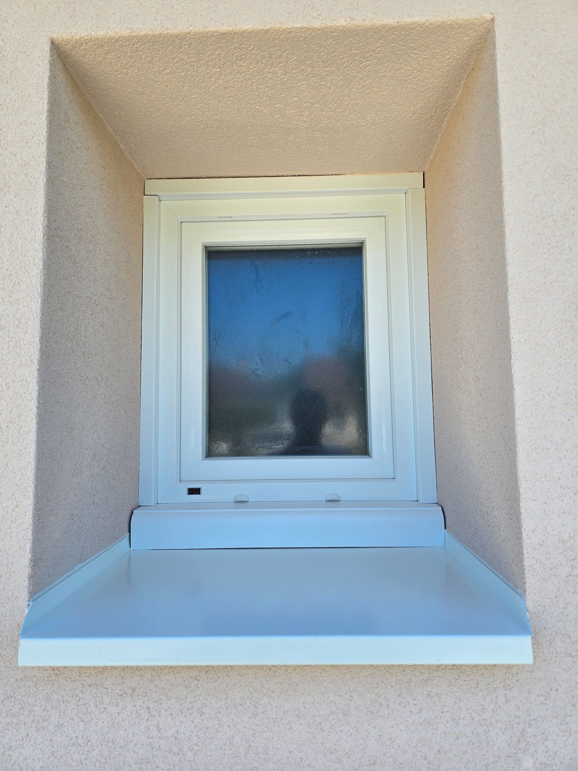 Zoom sur les finitions autour d'une fenêtre après ITE