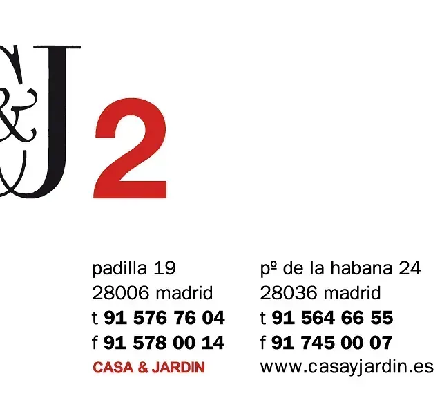 Tarjeta de visita con dirección y datos de contacto de CASA & JARDIN en Madrid.