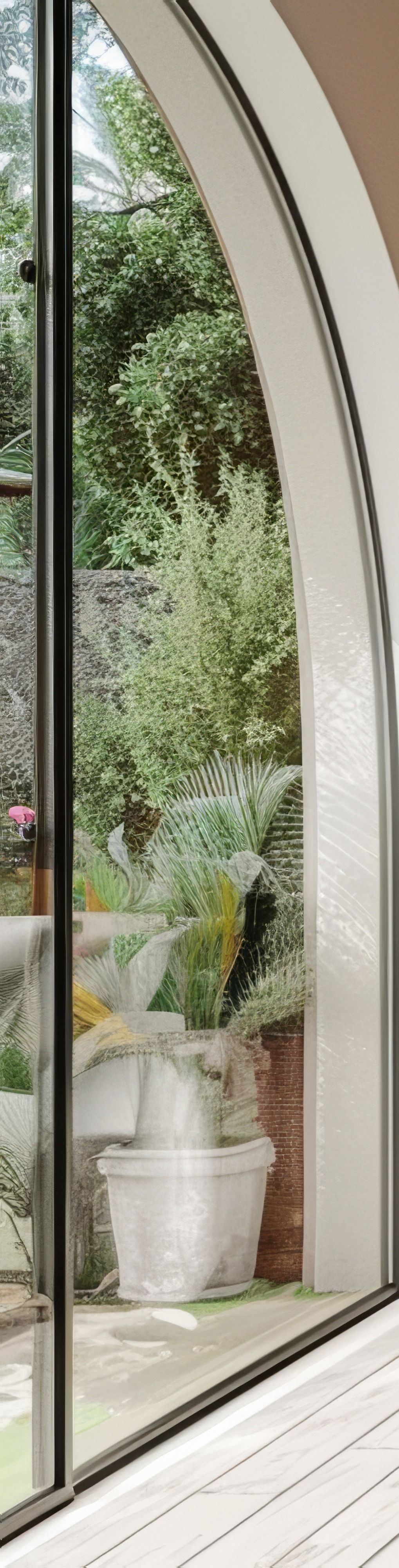 Vers la page Peintre à Cabestany Une fenêtre avec de la verdure dehors.