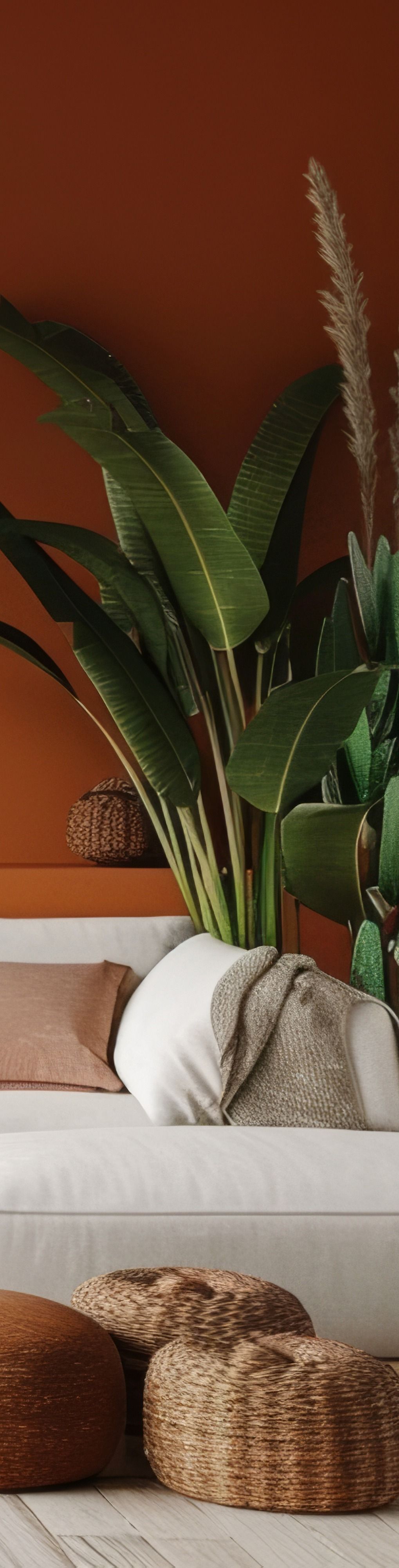 Vers la page Peintre à Canet-en-Roussillon Un pot de fleur blanc avec une plante verte à l'intérieur.